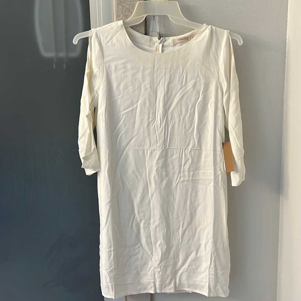 NWT ivory shift dress with sleeve detail.